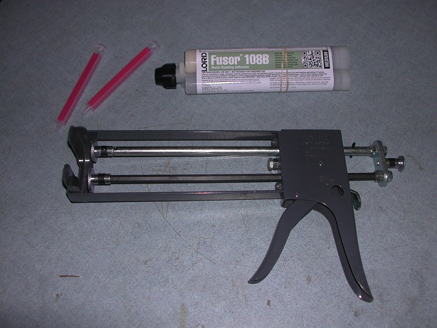 Adhesive